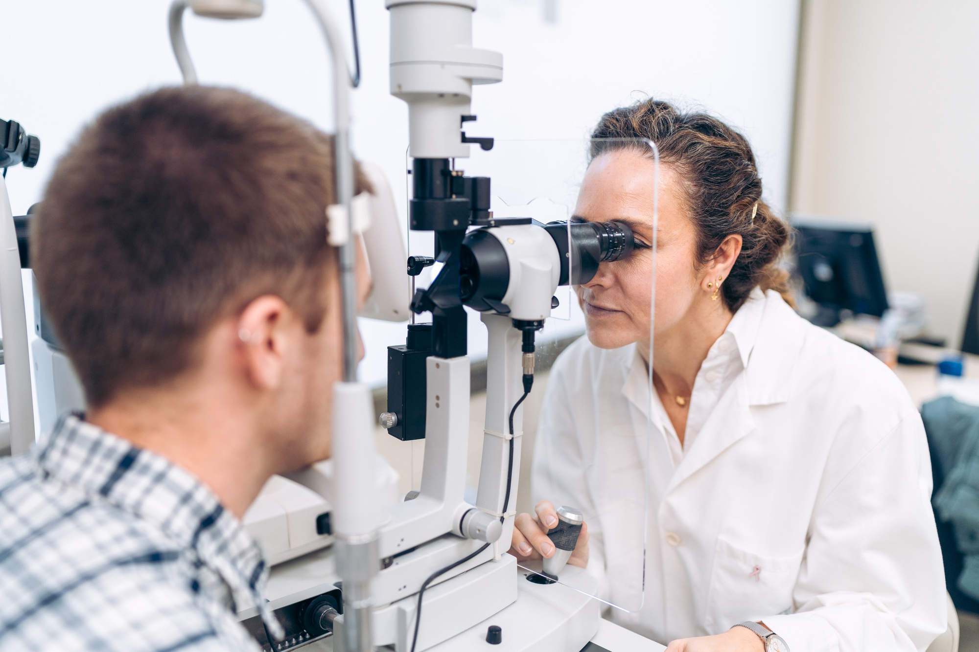 Ophthalmologist and Patient Interacting During an Eye Check-up