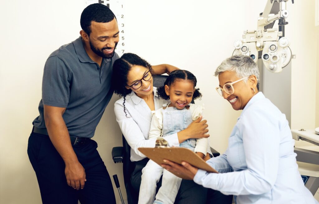 Family, optometry and eye care with a woman doctor in a clinic to see a patient for vision assessme